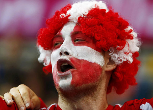 Painted faces of Olympic fans