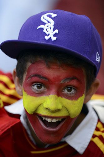 Painted faces of Olympic fans