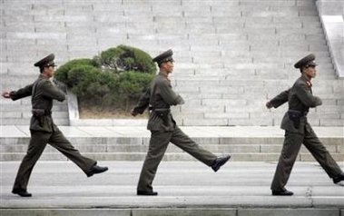 North Korean soldiers patrol the demilitarized zone which separates the two Koreas, November 1, 2006. 