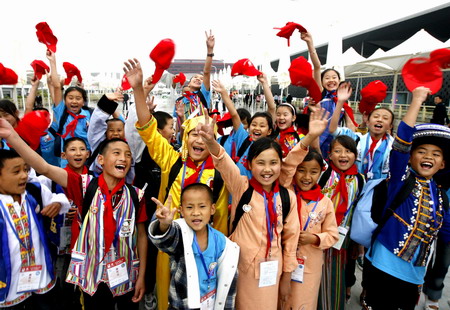Children walk out of mountain for Expo