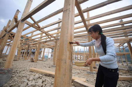 One year on, quake zone moves on