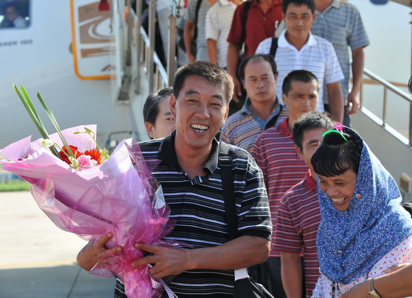 Chinese trawler crew seized by Japan back home