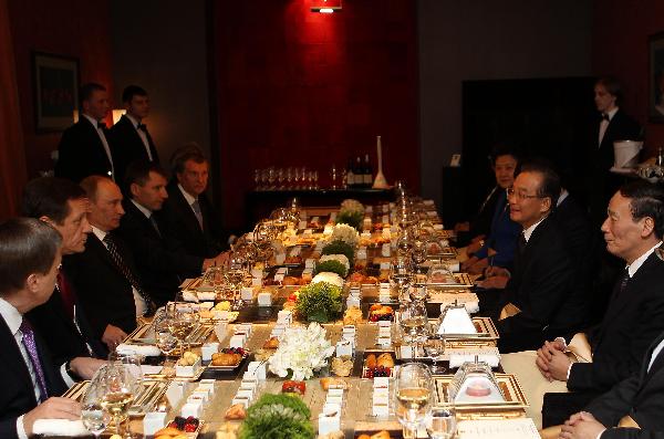 Wen, Putin vow to strengthen ties