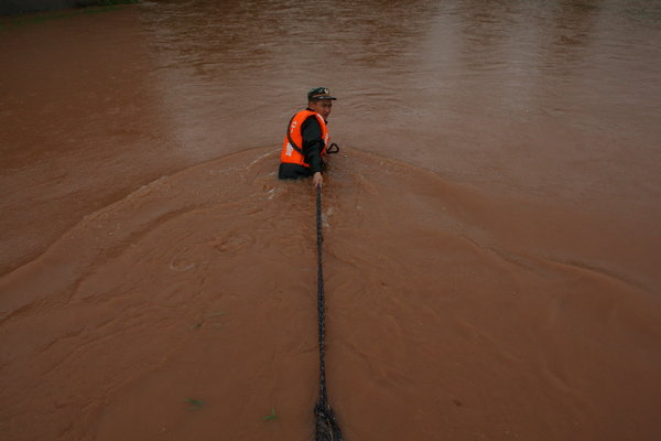 Heavy rains kill 11, affect millions