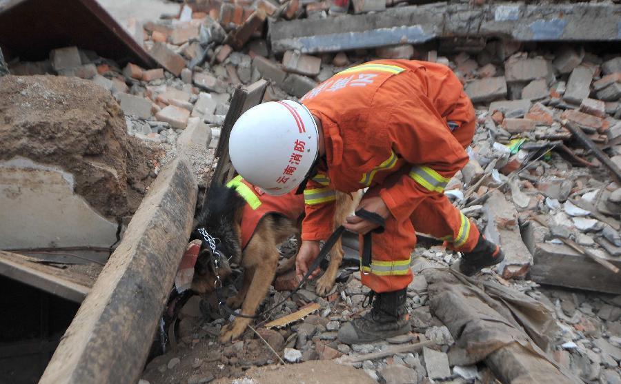 Rescue work continues as quake death toll hits 410