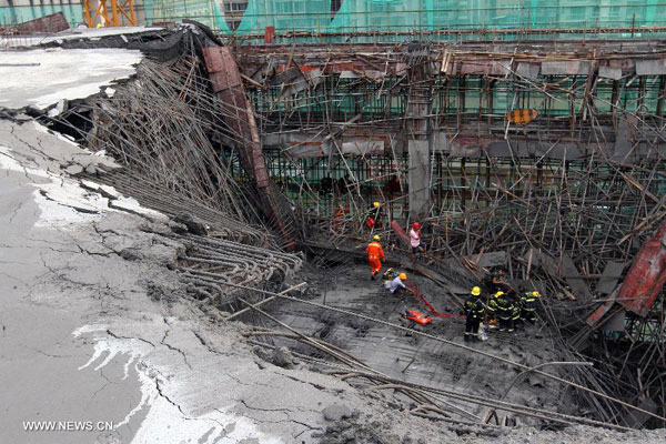 Rescuers save 3 trapped in collapsed building