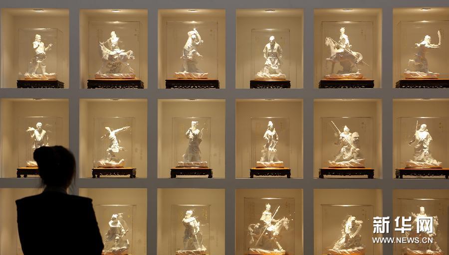 Porcelain figurines from <EM>Outlaws of the Marsh</EM> on display in Shenyang