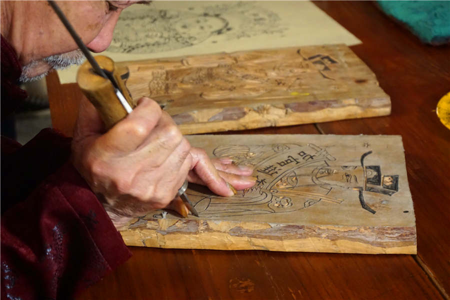 88-year-old wood engraver carves name in history books