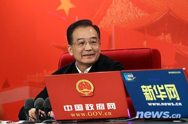 温家宝承诺任期内管好房价 知