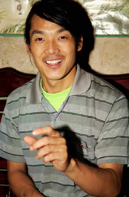“煤球哥”李新义：走得再远，我还是农民