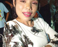 'Scorpion woman' breaks record