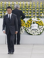 Japan PM says nuclear arms ban to remain