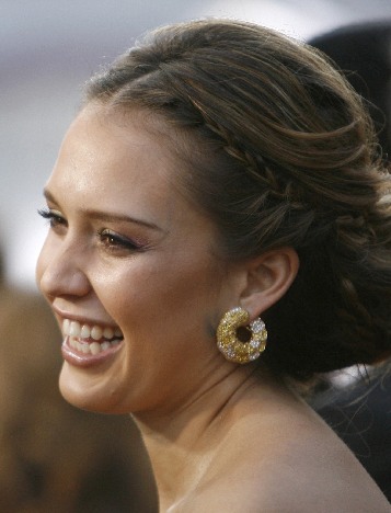 Jessica Alba arrives at the 80th annual Academy Awards