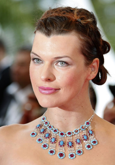 Actress Jovovich arrives on red carpet for the awards ceremony<BR>