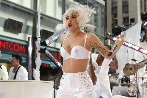 Lady Gaga performs during a rain shower on NBC's 