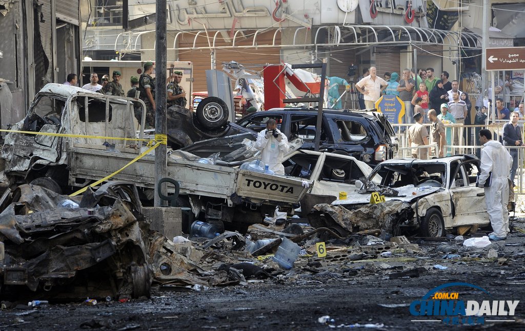 黎巴嫩政府调查爆炸现场 死伤300多人（高清组图）