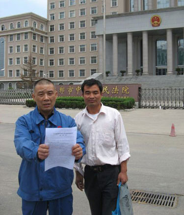 Two men compensated over 15-year imprisonment