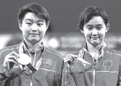 Teen titans stand tall in China's diving dynasty