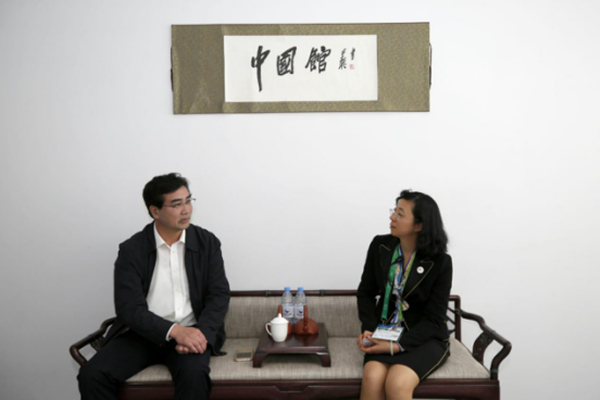 中国馆馆长舒寰会见青岛市政府副秘书长万建忠