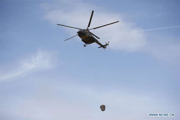 Re-entry capsule of SJ-10 lands in North China