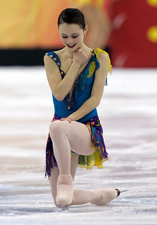 Sasha Cohen from the United States finishes in the women's short program during the Figure Skating competition at the Torino 2006 Winter Olympic Games in Turin, Italy February 21, 2006. [Reuters]