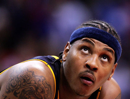 Denver Nuggets Carmelo Anthony reacts during their 98-87 loss to the Los Angeles Clippers during game Two of the NBA Western Conference first round playoff series in Los Angeles April 24, 2006.