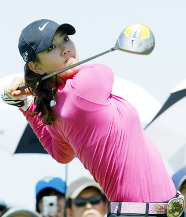 American golfer Michelle Wie looks at her driver shot on the 3rd hole of the SK Telecom Open 2006 golf tournament at the Sky 72 Golf Club in Inchon, west of Seoul, May 7, 2006. 