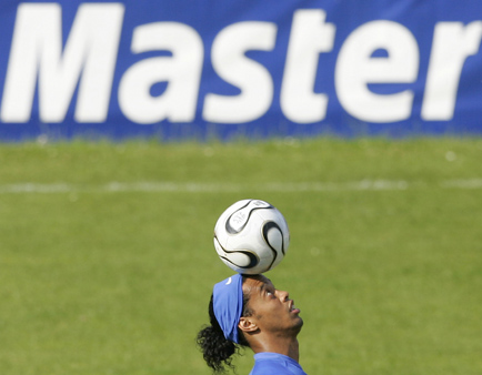 Ronaldinho plays with a soccer ball 