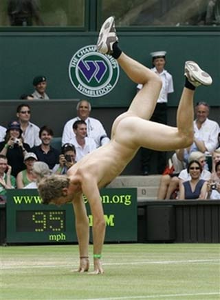 An unidentified streaker does a cartwheel, as he interrupts the Women's Singles quarter-final match between Maria Sharapova and Elena Dementieva, both of Russia, on the Cemtre Court at Wimbledon, Tuesday, July 4, 2006. [AP Photo]