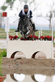 Kim Hyung-chil of South Korea, on Bundaberg Black, jumps during the Equestrian Cross Country event at the 15th Asian Games in Doha December 7, 2006. Kim was killed after falling off the horse. [Reuters]