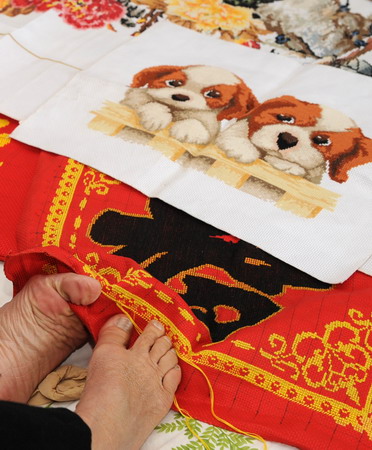 Armless embroiderer heads to Expo for exhibition