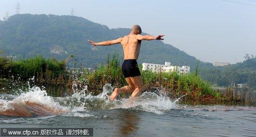 Shaolin monk demonstrates water 'flight'