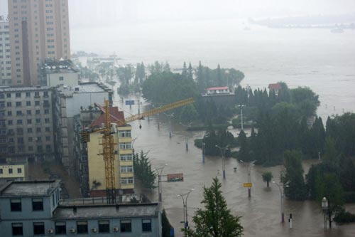 50,000 people evacuated after flood hits NE China