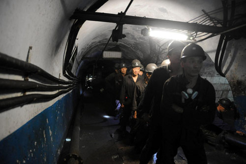 Search for 16 trapped miners continues