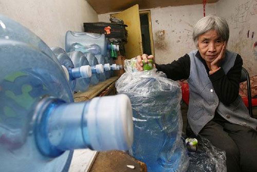 Woman in her 70s delivers water to support family