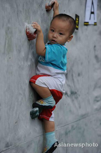 Baby rock climbs before he can walk