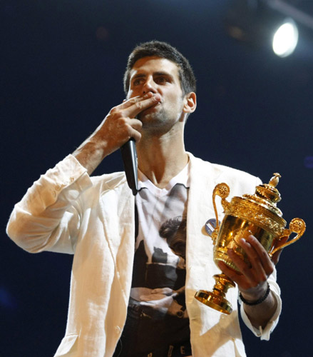 Thousands give Wimbledon king Djokovic hero's welcome