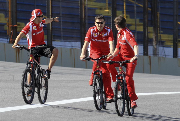 F1 drivers hit the track ahead of match...on bicycle