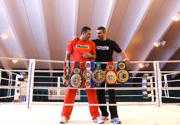 Mighty brothers show off trophy before fight