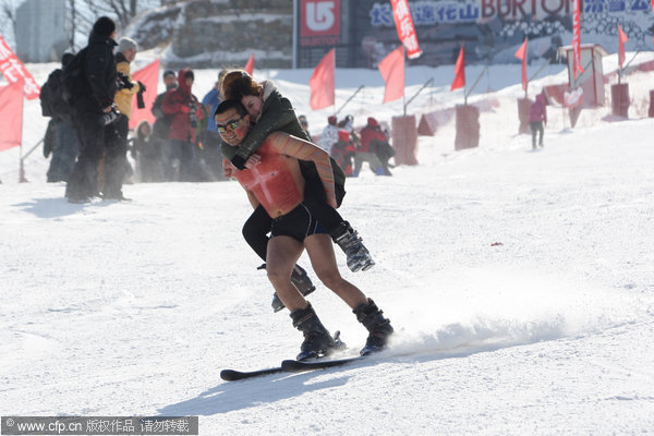 Underwear skiers enjoy fun and games in snow