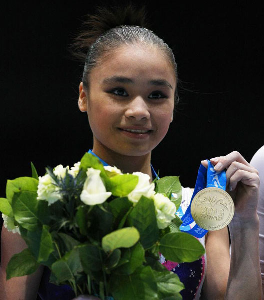 Huang Huidan wins world woman's uneven bar title