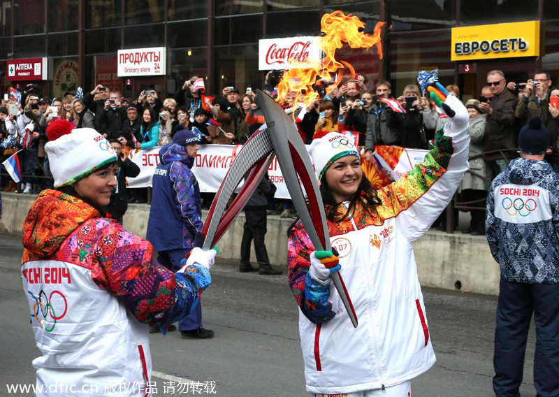 Olympic flame in Sochi after world's longest relay
