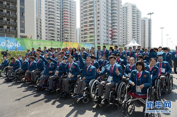 Chinese Paralympic delegates attend flag-raising ceremony
