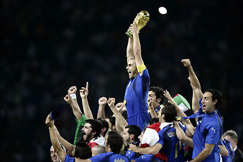 PICTURES OF THE YEAR 2006 Italy's Fabio Cannavaro lifts the World Cup Trophy after the World Cup 2006 final soccer match between Italy and France in Berlin July 9, 2006.