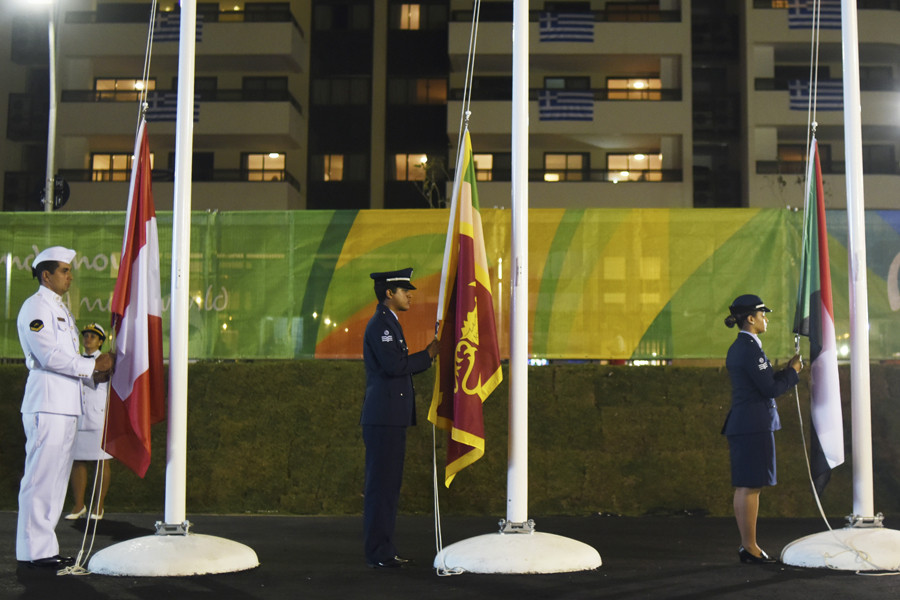 Rio Olympic Village: Flags, athletes and samba