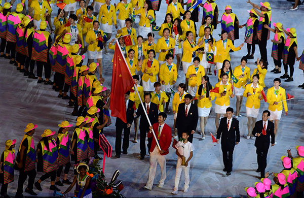 Fencing champion Lei Sheng leads China into opening ceremony