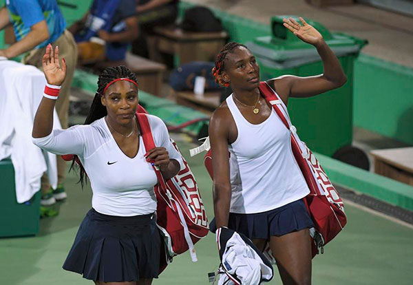 Williams sisters crashed out of doubles