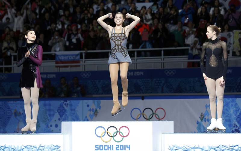 Russian stuns Kim to win dramatic figure skating gold