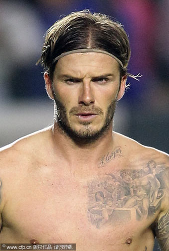 Beckham reveals new tattoo of daughter's name