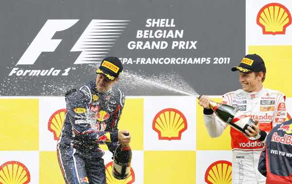 Vettel converts pole into win in Belgium